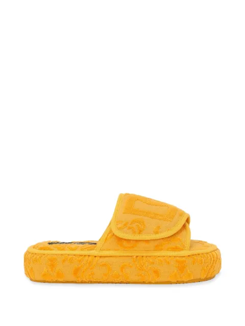Dolce & Gabbana logo-embroidered slippers Yellow TCF011TCAGM