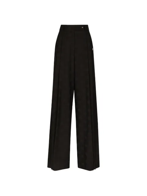 Dolce & Gabbana all-over logo print trousers Black FTCP2TFJBAK