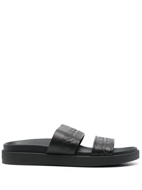 Calvin Klein embossed-logo leather slides Black HW0HW01535