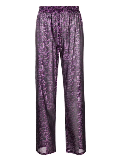 Versace logo-print semi-sheer pants Black 10101371A07