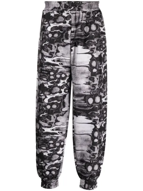 ISO.POETISM Khumbu abstract-print track pants Black P17KHUMBUF044