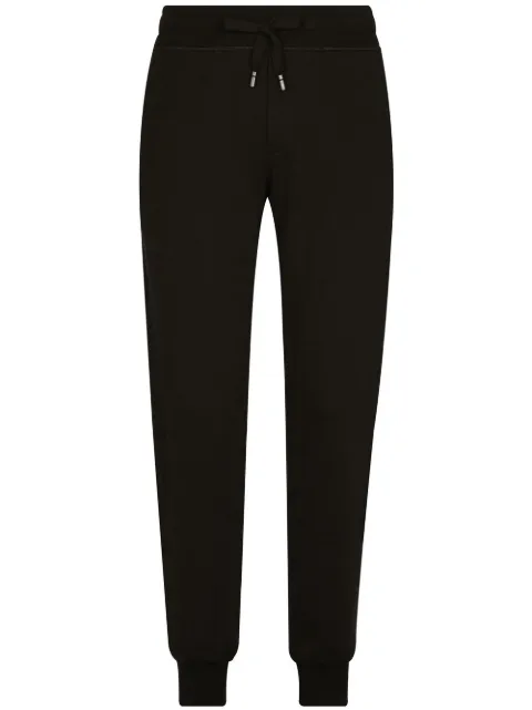 Dolce & Gabbana logo-tag track pants Black GVXQHTG7F2GN0000