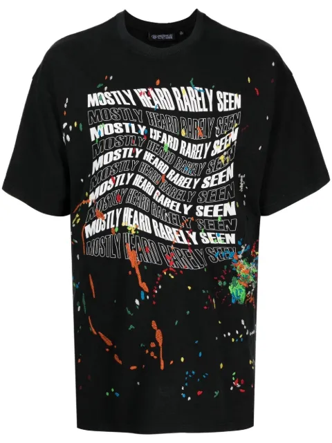Mostly Heard Rarely Seen Warped-Logo paint-splatter T-shirt Black MH02BCT06