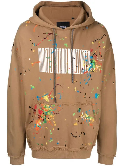 Mostly Heard Rarely Seen logo-print paint-splatter hoodie Brown MH02BCKH02