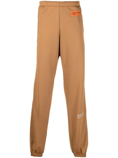 Heron Preston logo-patch track pants Brown HMCJ010F22JER0016401