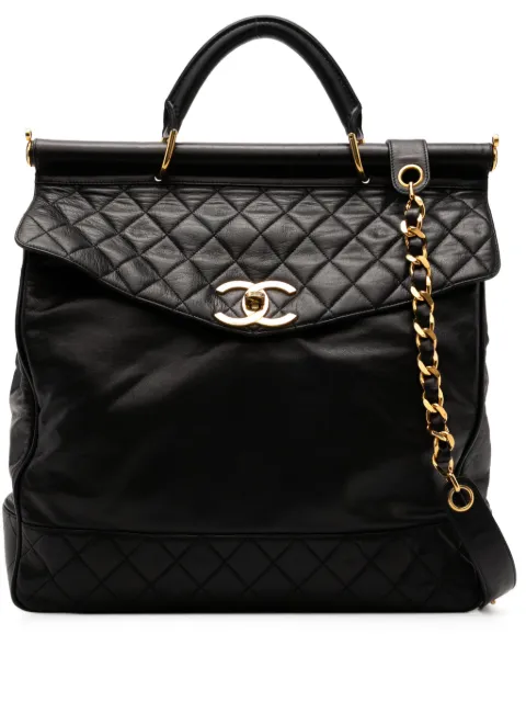 CHANEL Pre-Owned 1990 quilted briefcase crossbody bag Black CHANEL90SVINTAGEQUILTEDTOPHANDLEBRIEFCASELARGEWORKTRAVELCROSSBODYBAG