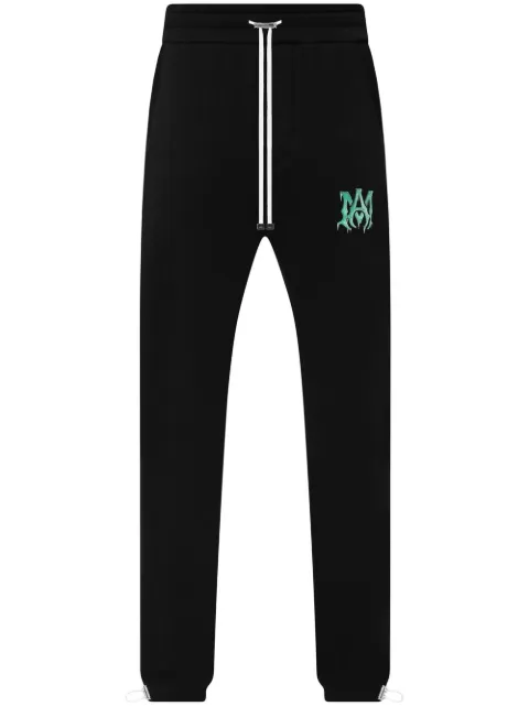 AMIRI logo-motif organic cotton track pants Black MJL021015