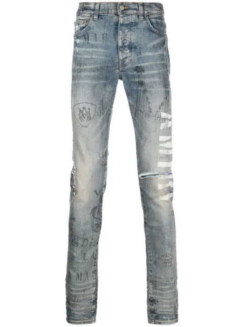AMIRI slim-fit illustration print jeans Blue PF22MDS024