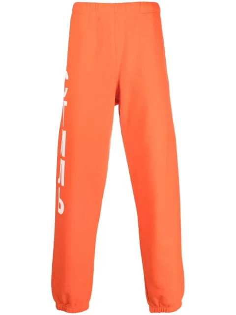 Heron Preston logo-print track pants Orange HMCH027C99JER0012201