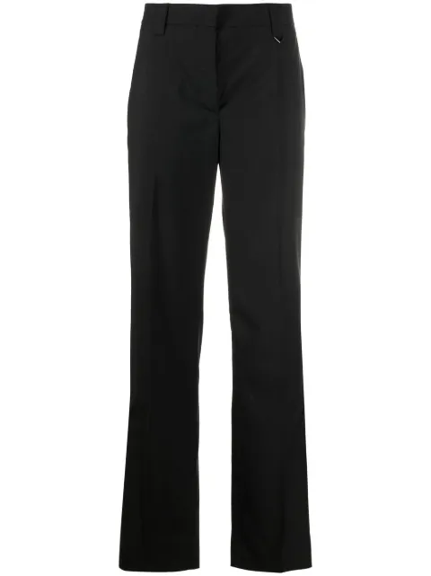 Prada tailored logo-plaque trousers Black P251GS2221XMY
