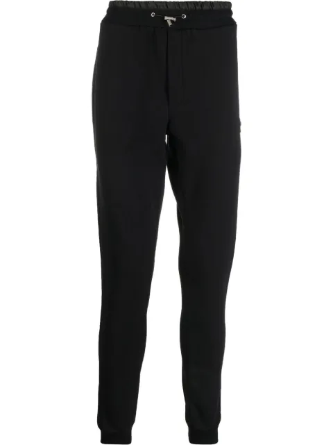 Philipp Plein logo-patch track pants Black FABCMJT2043PJY002N