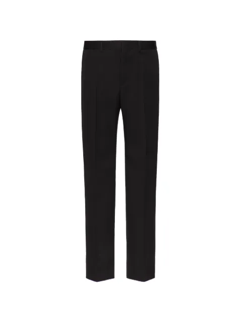 Valentino Garavani pressed-crease tailored trousers Black VRBI608HU