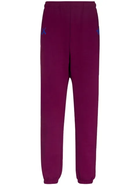 The North Face x KAWS track pants Purple NF0A7WLK