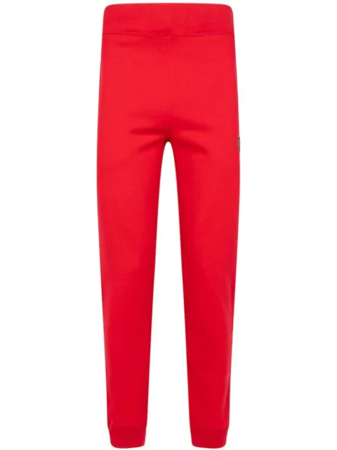 A BATHING APE® x Kid Cudi logo-patch track pants Red 83122131