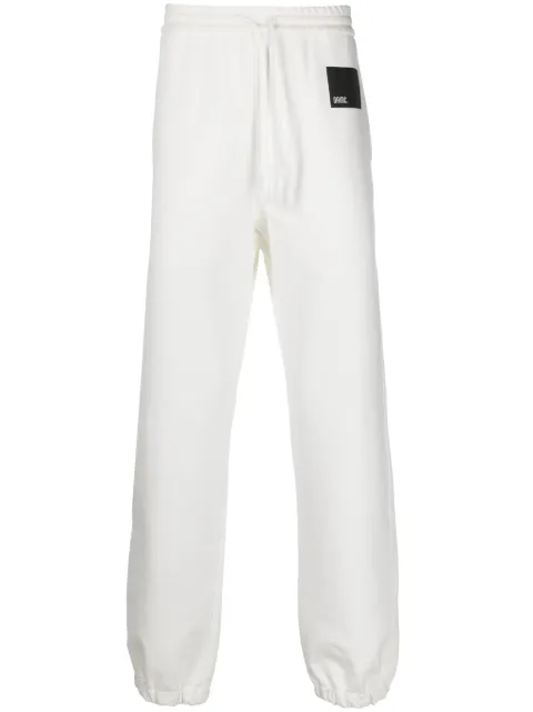 OAMC logo-patch cotton track pants White OAMU705601COT00726
