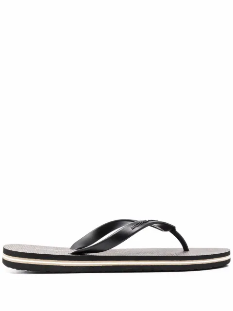 Michael Kors Travis thong-strap flip flops Black 42S2TRFA2Q