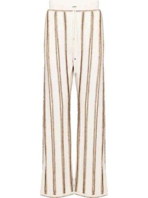 AMIRI flared striped track pants Neutrals SS22MJP001