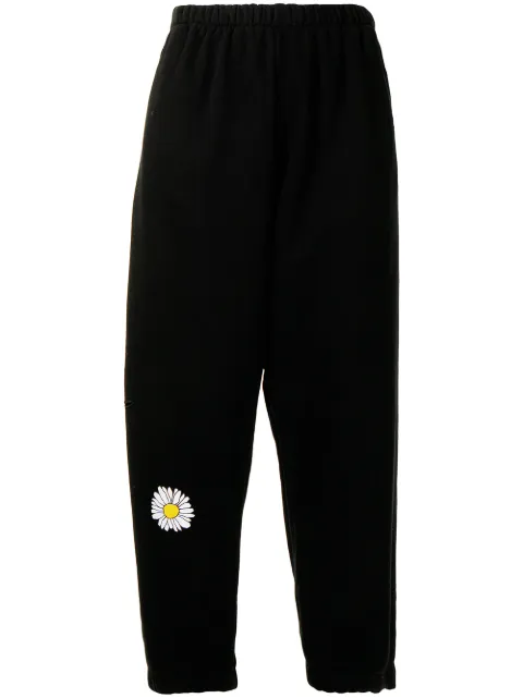 Natasha Zinko daisy-print cropped track pants Black FW2150501