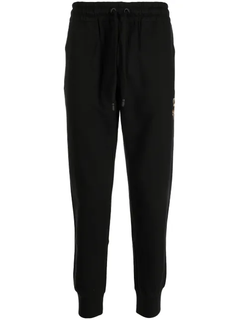 Dolce & Gabbana crest-embroidered track pants Black GWJVAZHU7H9
