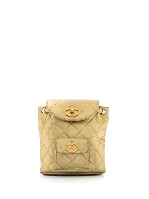 CHANEL Pre-Owned 1991-1994 metallic flap drawstring backpack Gold CHAA6900