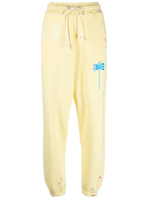 Palm Angels palm-tree print track pants Yellow PWCH006S21FLE001