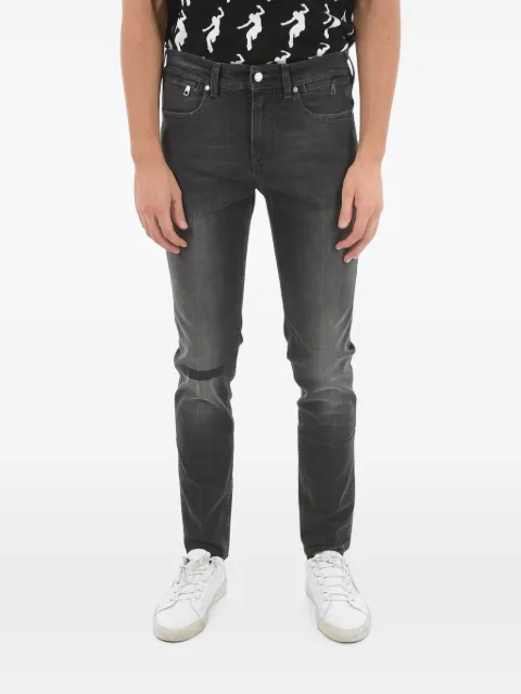 Neil Barrett skinny fit faded jeans Black PBDE006SG9804