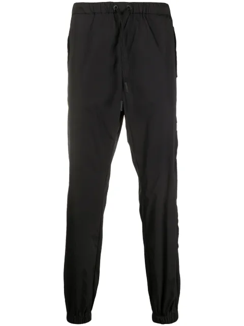 COUNTY OF MILAN Cross tapered track pants Black CMCA155E20FAB0011010