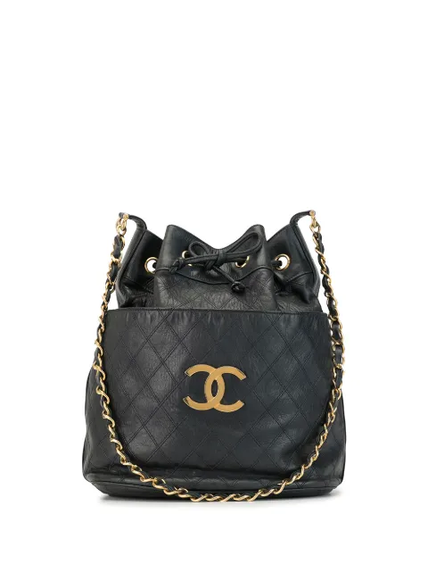 CHANEL Pre-Owned 1990s stitch CC plate drawstring shoulder bag Blue 1160515