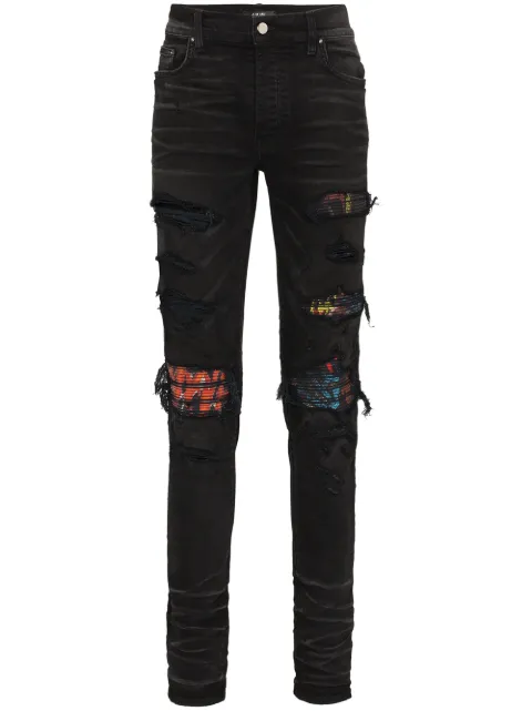 AMIRI MX1 patch distressed slim-leg jeans Black S0M01160SD