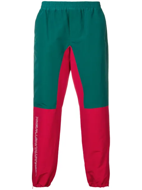 JohnUNDERCOVER colour-block track trousers Green JUW45071